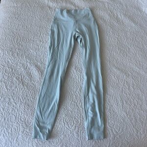 Lululemon light blue double lined 28 inch leggings. Size 4. Signs of wear.